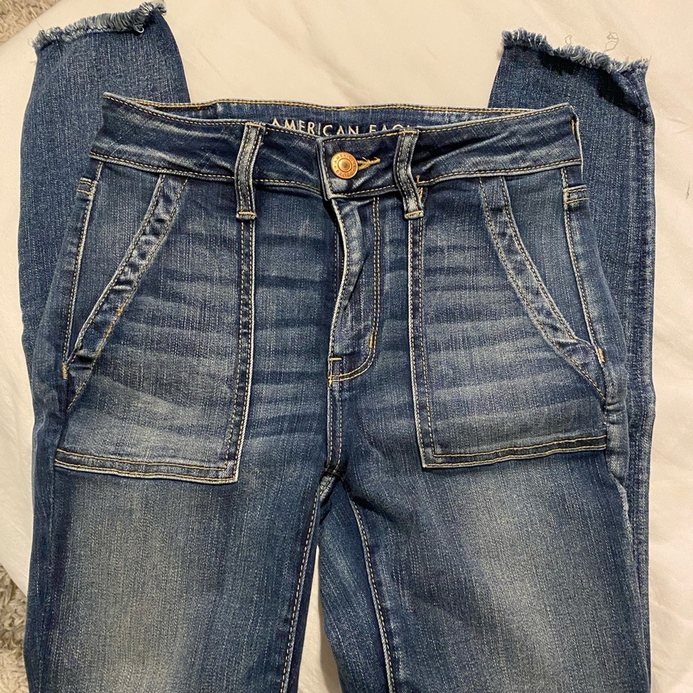 American Eagle distressed bottoms jeans